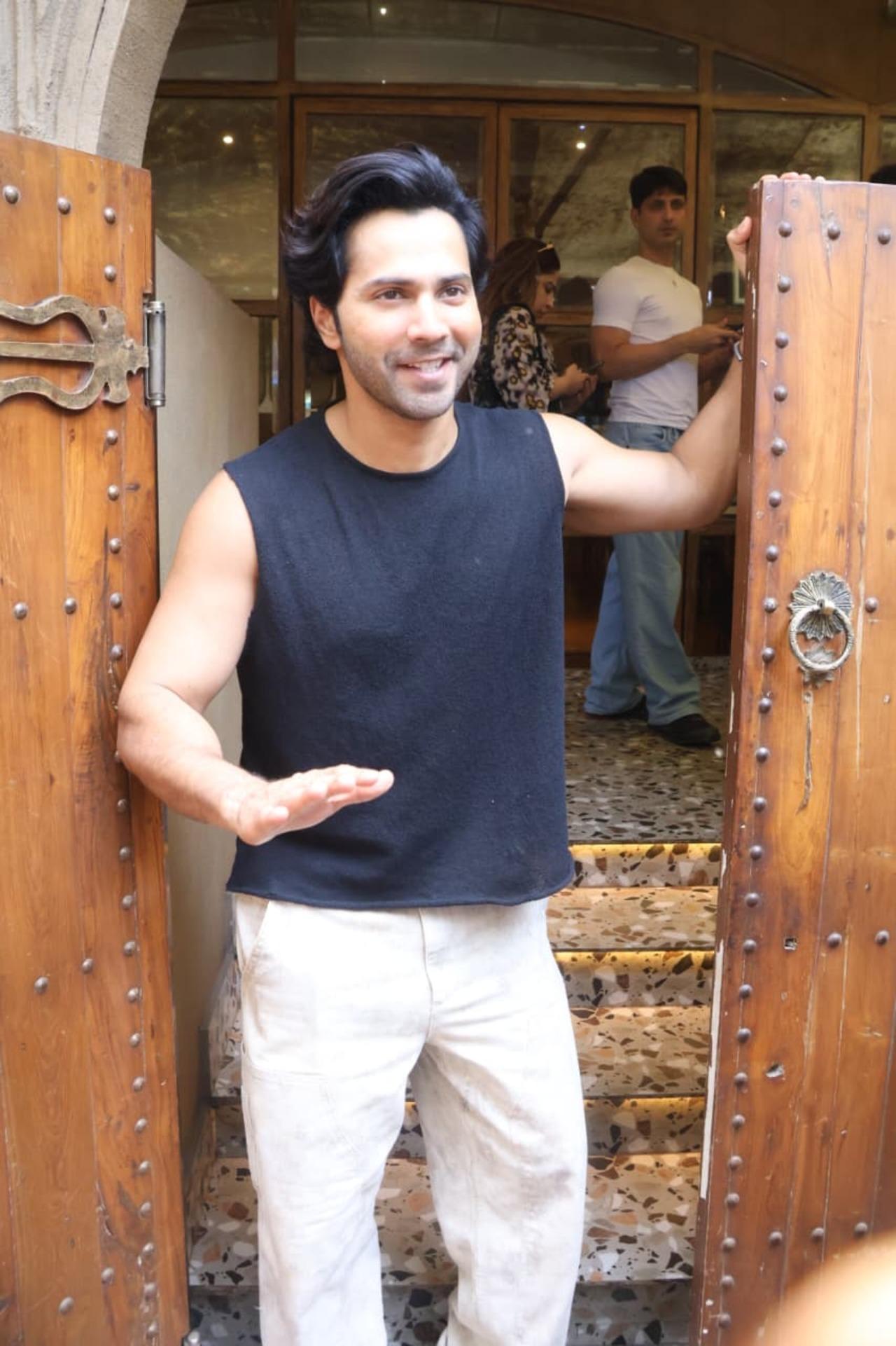 Varun Dhawan was also spotted at a restaurant in the city, as he interacted with the paps stationed outside.